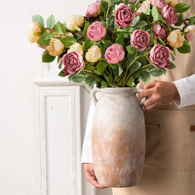 Dobbyby hand-painted vase showcases rustic texture for artisanal home styling.