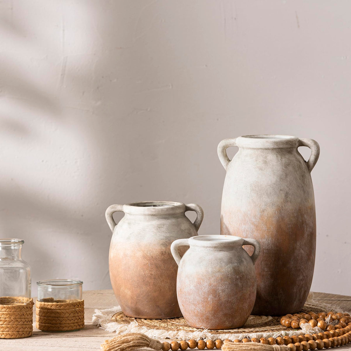 Dobbyby neutral-toned textured vase complements multiple interior styles.