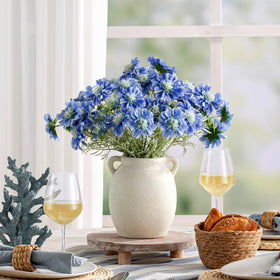 Dobbyby vase with dried stems on bookcase, a subtle decor statement.