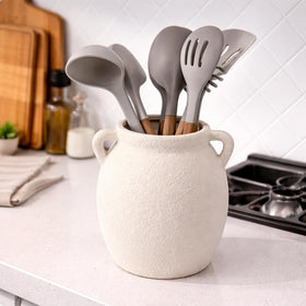 Dobbyby vase used as a utensil holder, showcasing functional elegance in kitchen.