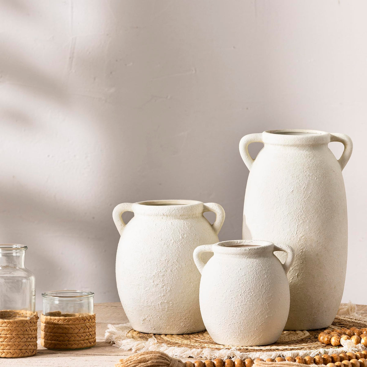 Dobbyby ceramic vase on mantel, blends boho and farmhouse aesthetics.