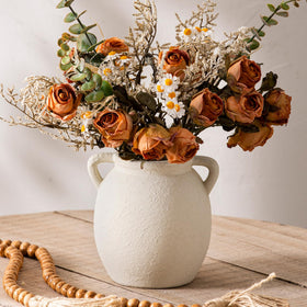 Dobbyby wedding centerpiece vase enhances reception decor.