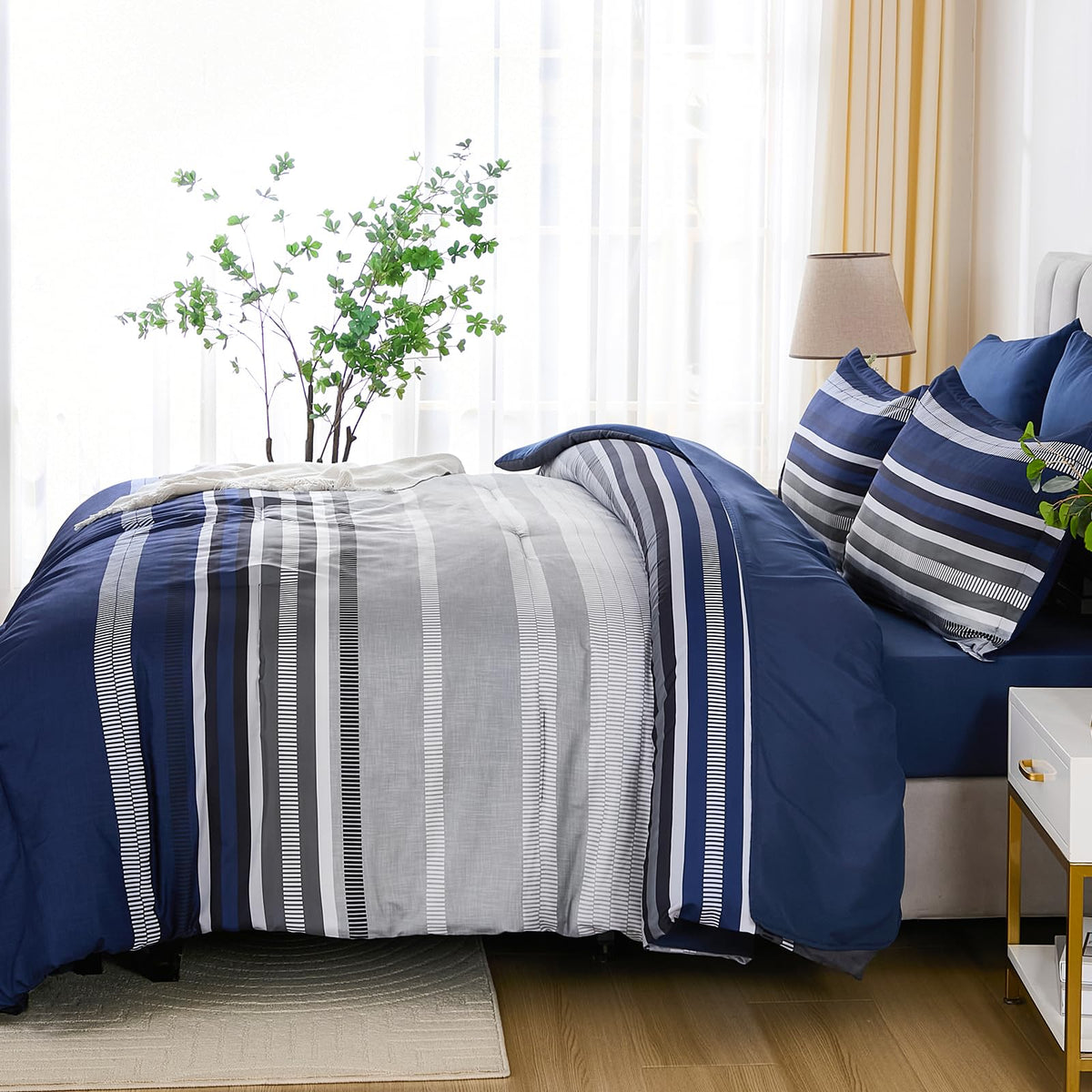 Dobuyly navy-blue comforter closeup reveals plush microfiber texture.