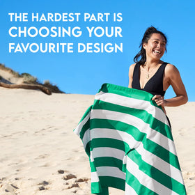 Dock & Bay sand-free towel helps keep sand away after playful shore fun.