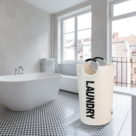 DOKEHOM beige laundry basket in use blends with room decor