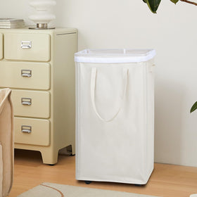 DOKEHOM beige laundry bin stores neatly when not in use.