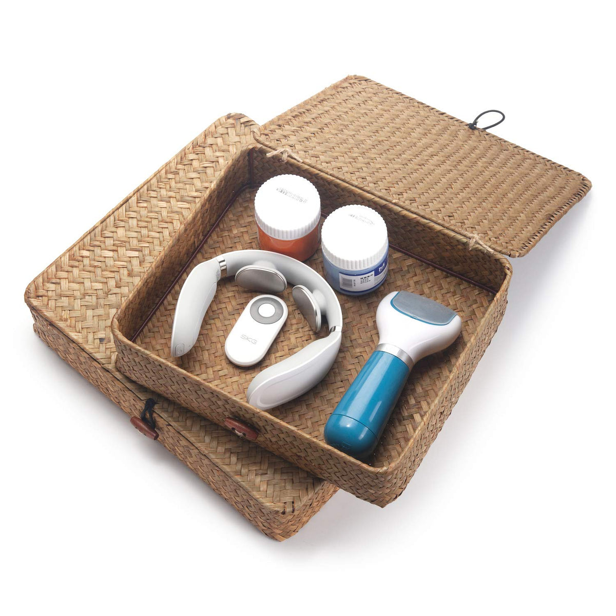 DOKOT seagrass bin on coffee table keeps essentials neatly at hand.
