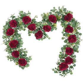 Dolicer 2-piece 13ft eucalyptus garland draped on an arch for wedding ambiance.
