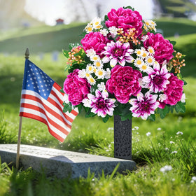 Dolicer ground-insert vases securely stabilize grave decorations.