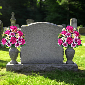 Dolicer red-with-white flowers create a respectful memorial ambiance.