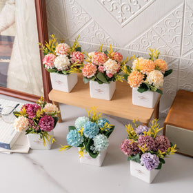 Donmills hydrangea shelf decor with a stable ceramic pot base.