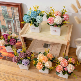 Donmills hydrangea tabletop centerpiece showcased on a dining table.
