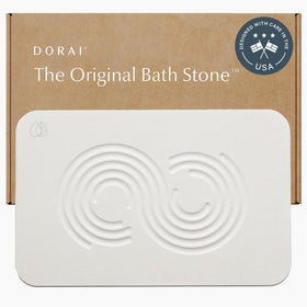 Dorai Stone Bath Mat in Rain Sandstone lies flat and dries quickly for a dry bathroom floor