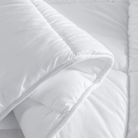 Dorrin Nessin winter cozy bed scene conveys warmth.