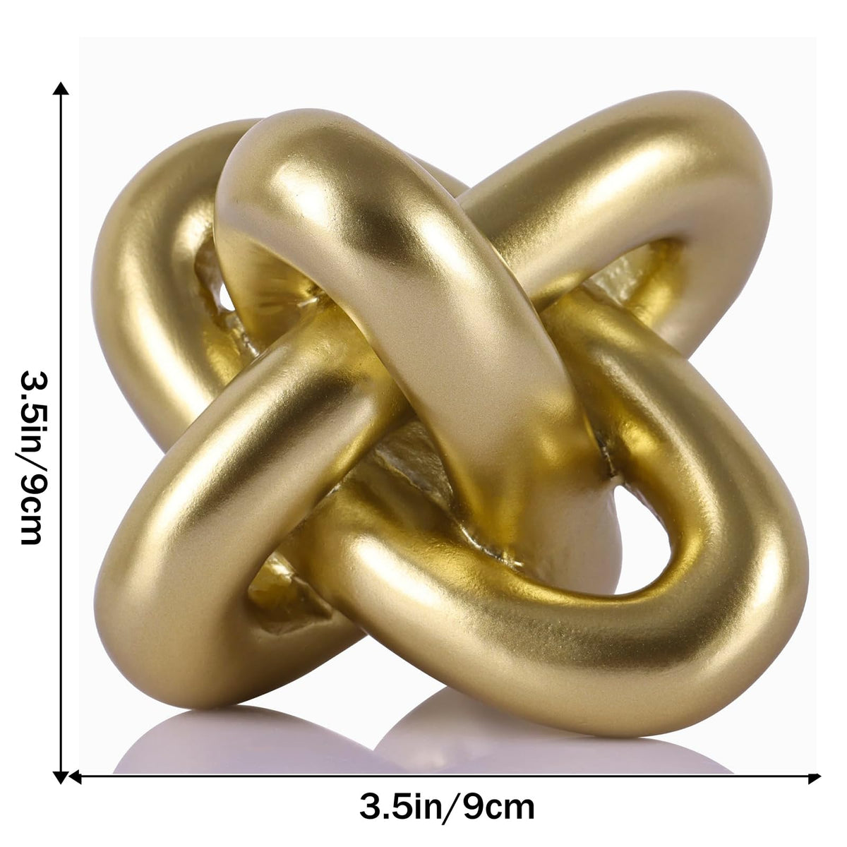 DOVDOV Three Knot Sculpture adds artistic texture to a coffee table.