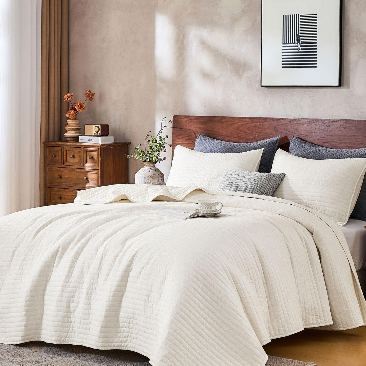 Down Home queen quilt set with shams on a bed for all season comfort