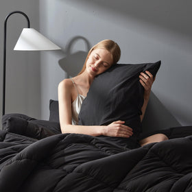 Downcool corner tabs keep the comforter secure on the bed