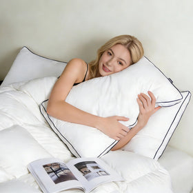DOWNCOOL king-size pillow supports better sleep without stiffness
