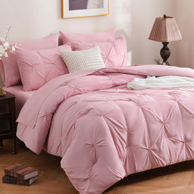 Downcool pinch-pleat king comforter close-up showing elegant texture for stylish bedrooms.