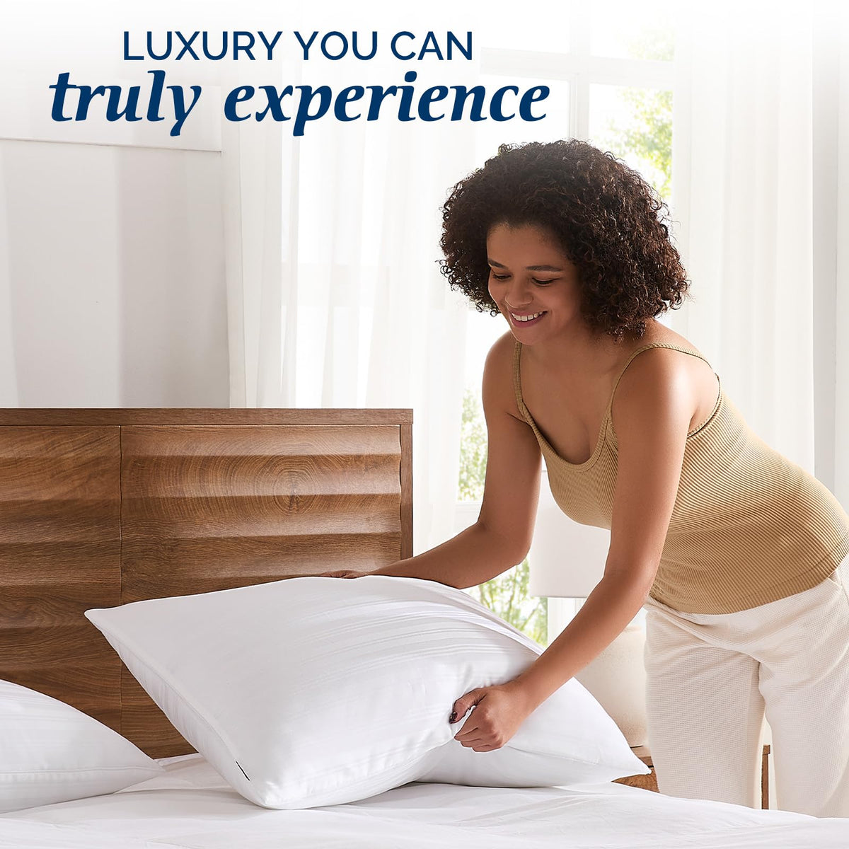 Downluxe pillow with 10% down and 90% feather blend for supportive loft.