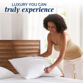 Downluxe pillow with 10% down and 90% feather blend for supportive loft.