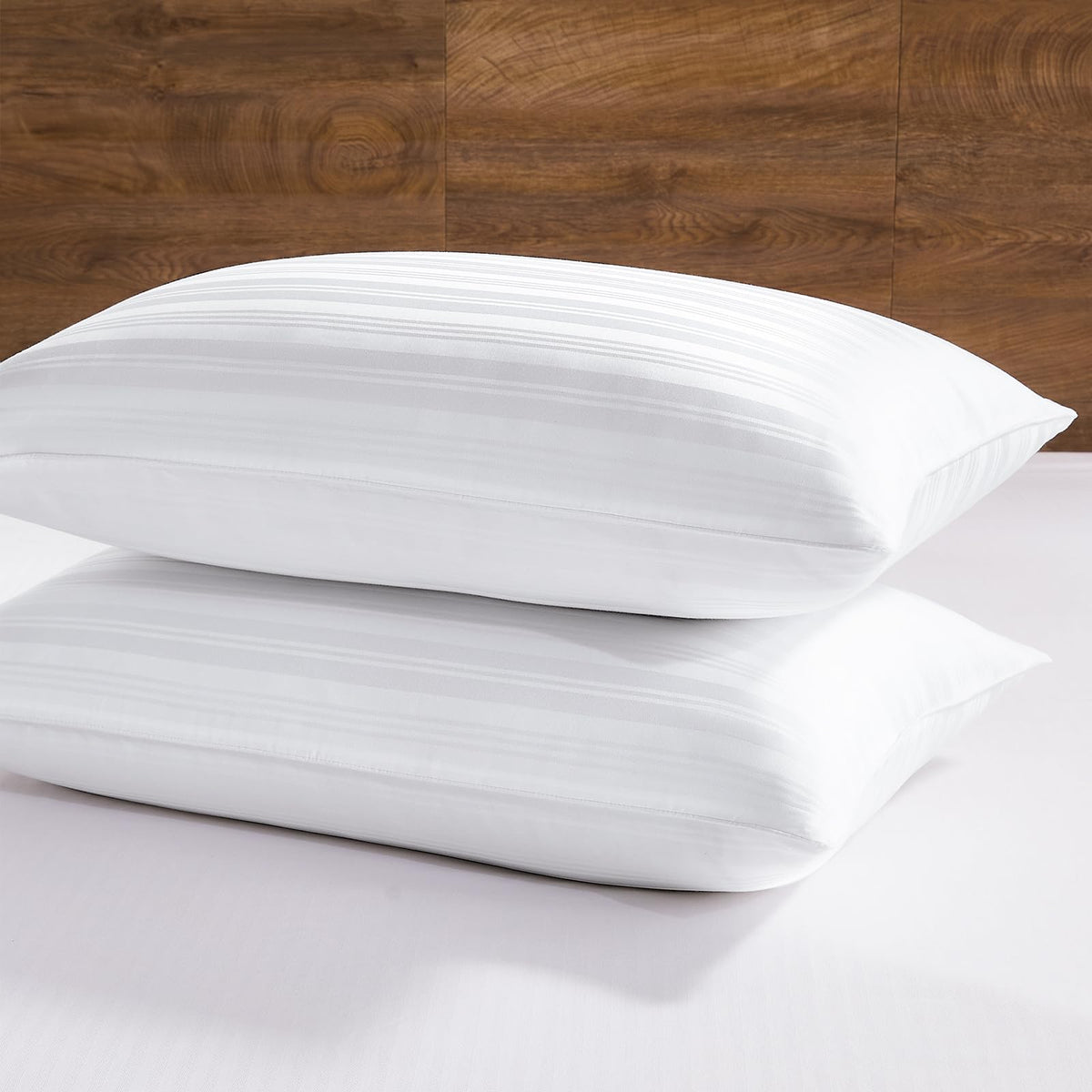 Downluxe goose feather pillows king 20x36 offer versatile support for all sleep positions.