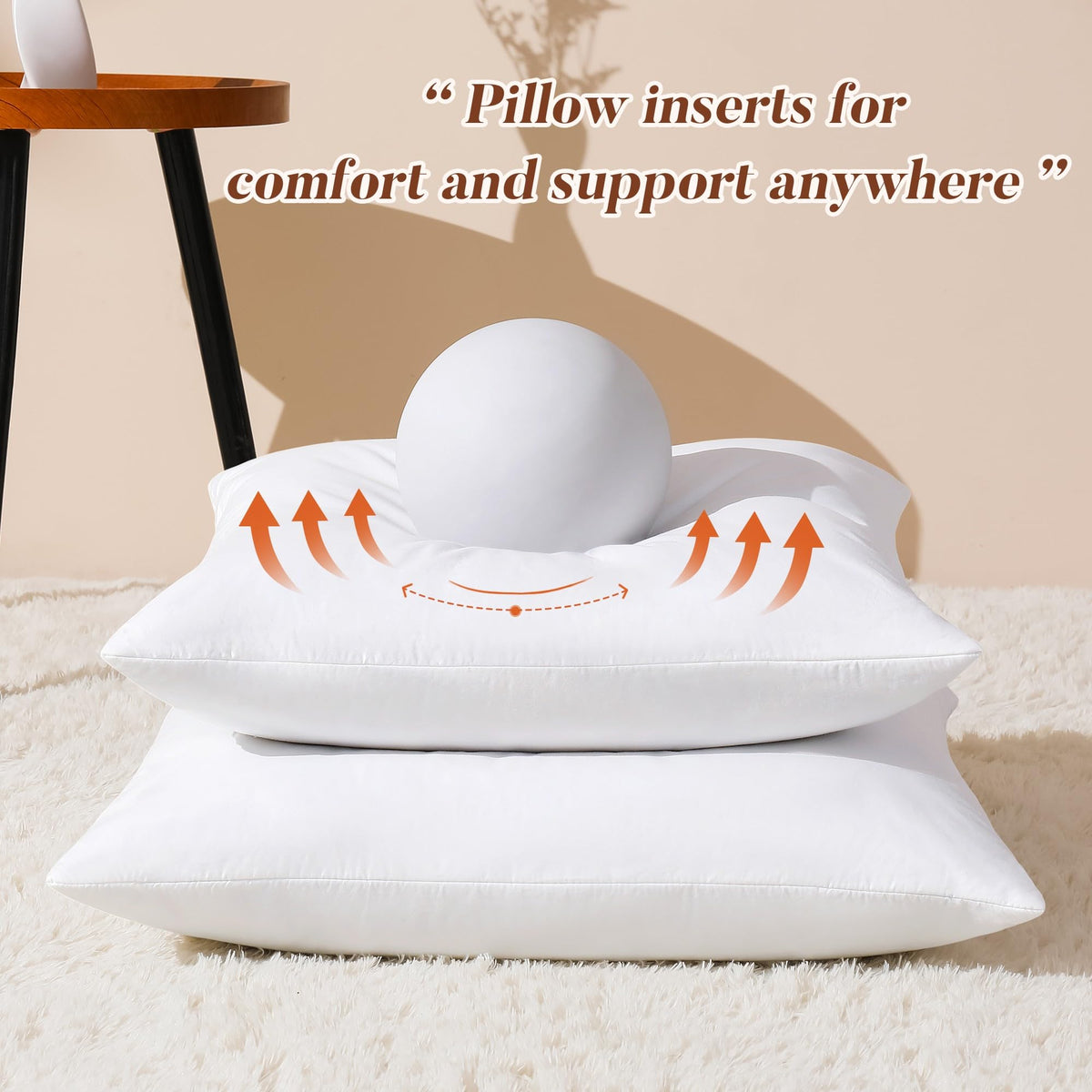 DOWNSTORIA pillow insert being fluffed after unpacking for full loft
