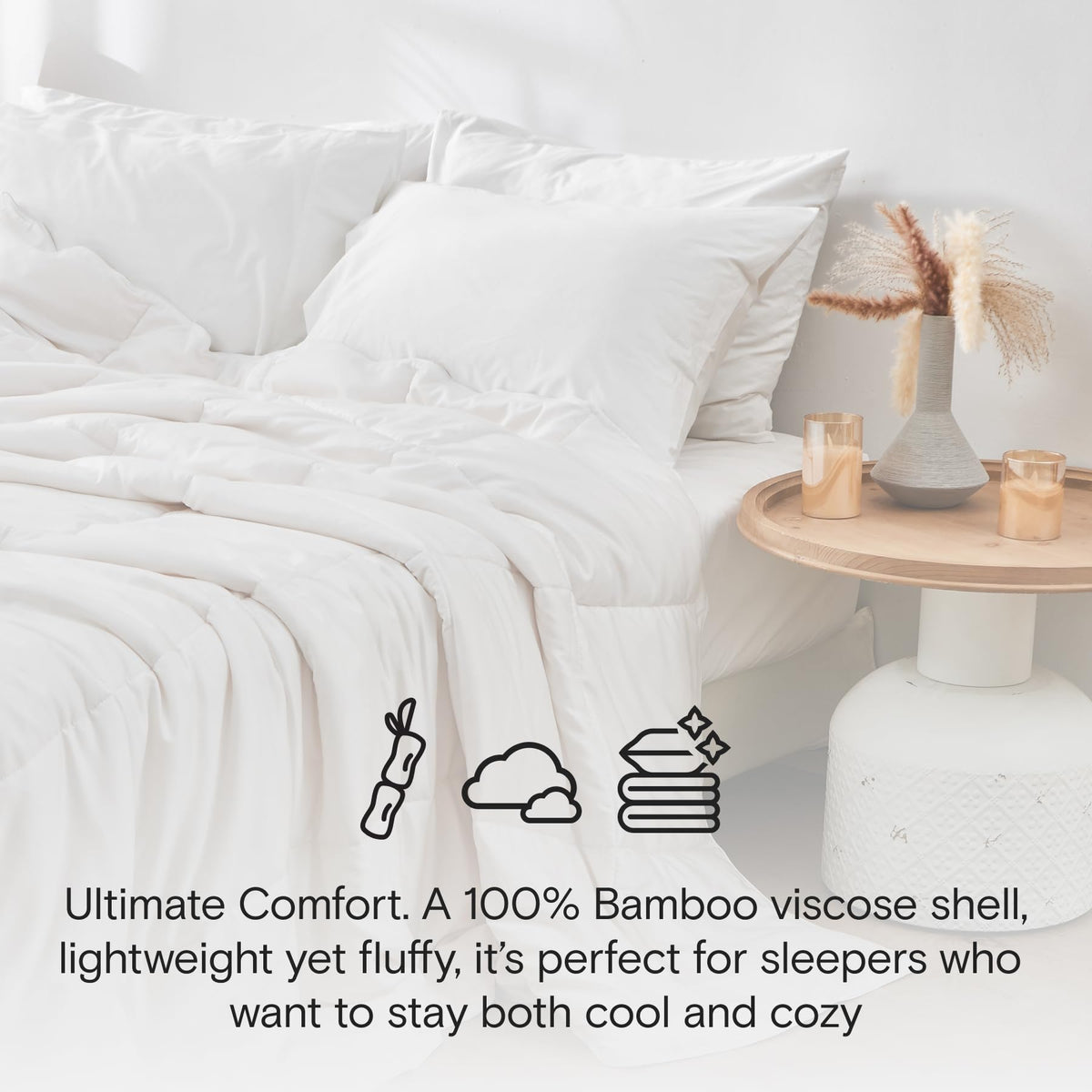 DOZ all-season comforter on bed highlights lightweight, breathable warmth for comfortable nights.