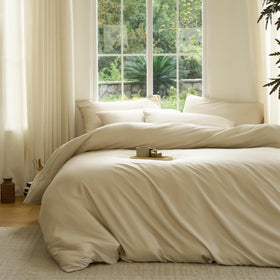 DOZ duvet cover set in sand, king flatlay highlighting soft bamboo viscose texture