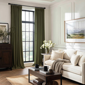 Drapenova forest green pinch-pleat velvet curtain enhances silhouette