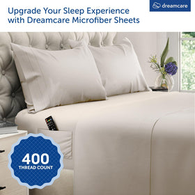 DREAMCARE deep-pocket fitted sheet secures a mattress up to 15 inches thick.
