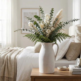 DREAMLOOM vase with non-slip base protects surfaces during placement.