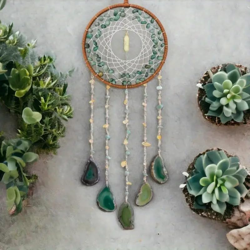 Dreamocean boho crystal dream catcher in green turquoise window catching sunlight and creating soft glow