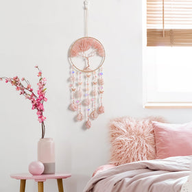 Dreamocean crystal suncatcher on window creating rainbow light effects