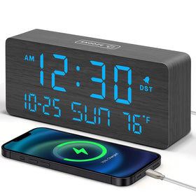 DreamSky wooden digital alarm clock on a bedside stand showing time, date, and temperature clearly