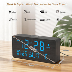 DreamSky wooden alarm clock on a living room desk with date and temperature at a glance