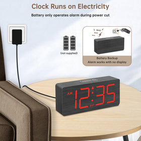 DreamSky wooden alarm clock showing dimmer controls for comfortable brightness at any hour.