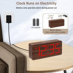 DreamSky wooden clock display close-up showing dimmer option for comfortable night viewing.