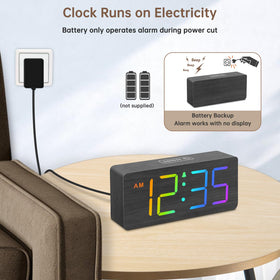 DreamSky wooden clock with six brightness levels for day and night viewing.