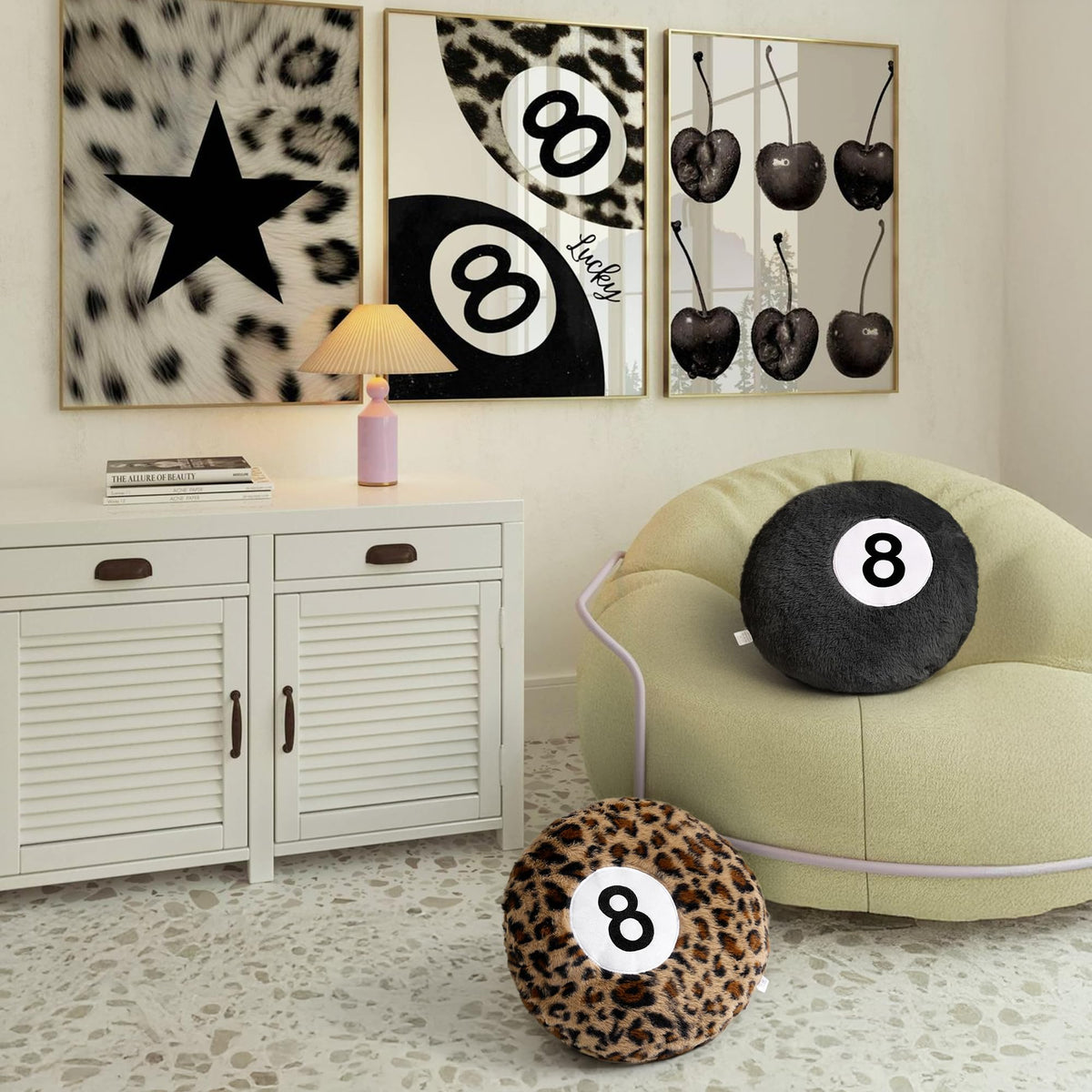 Dripykiaa sofa pillow adds chic, fashion-forward focal point.