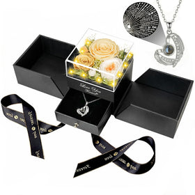 DRTINA preserved rose in a lighting display enhances romantic gift presentation.