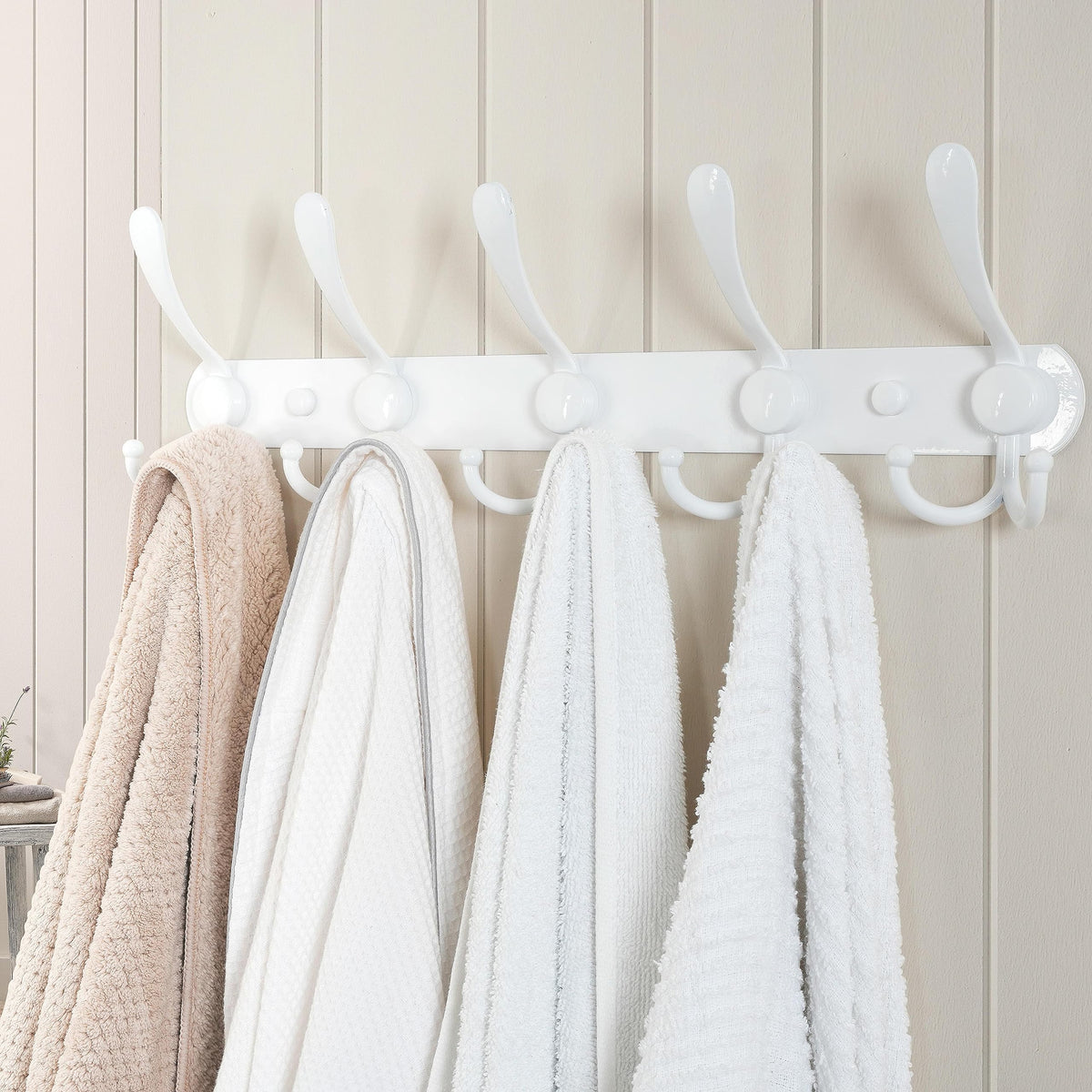 Dseap stainless steel rail with aluminum hooks supports heavy garments securely.