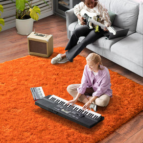 Dssimo orange decor rug suits dorm interiors with a modern touch
