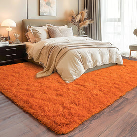 Dssimo kids-room orange shag rug provides soft, safe play space