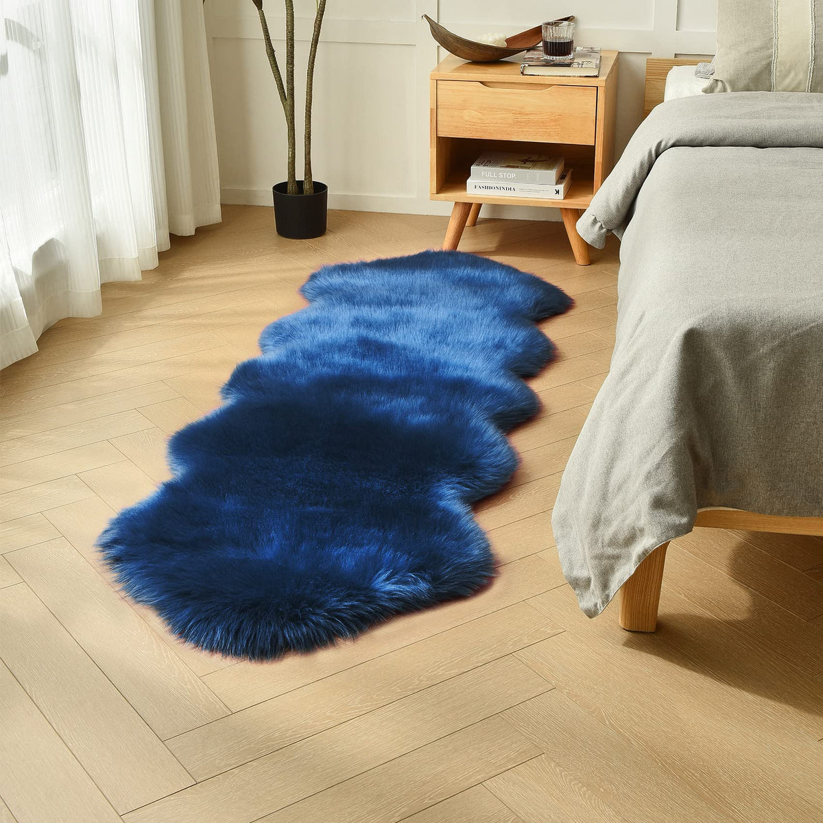 Duduta navy blue faux sheepskin runner with plush 3-inch pile for cozy spaces.