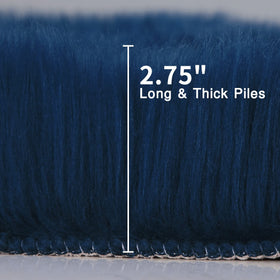 Duduta navy blue nursery rug offers soft, low-shedding comfort for kids.