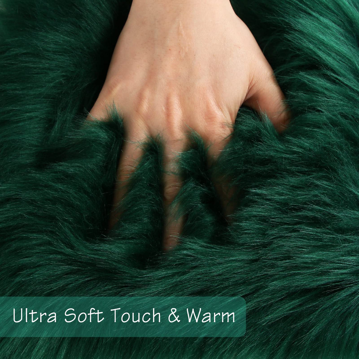 Duduta soft emerald green sheepskin rug with non-slip backing.