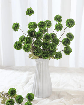 Chic pom-pom mums add modern or rustic charm to dining tables.