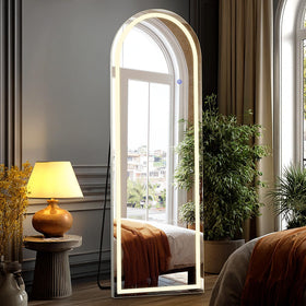 DUMOS arched LED mirror on stand offers full-length reflection for outfits.