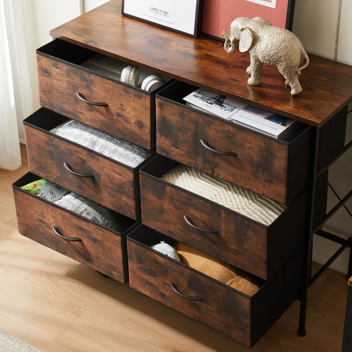 DUMOS six fabric drawers keep electronics and clothes organized.